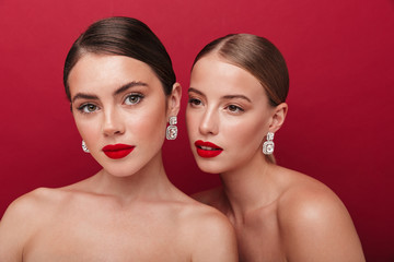 Beautiful young two women with bright red lipstick