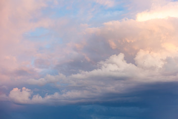 Obraz premium Big and thick clouds on the horizon. Blue sky with thick clouds. Soft focus