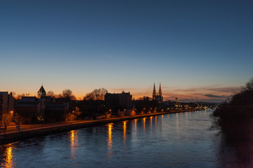 Fototapeta na wymiar Sunset over the skyline of Regensburg in Bavaria