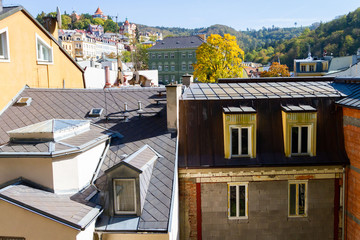 city views Karlovy Vary autumn. Czech Republic. Carlsbad. Roofs of church roof tiles. View from...