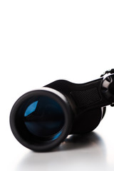 close up of black binoculars on white