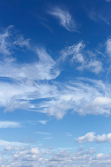 Naklejka premium Beautiful blue sky with white cirrus and cumulus clouds as a natural background