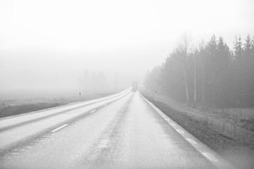 slippery morning road with poor wiew in november