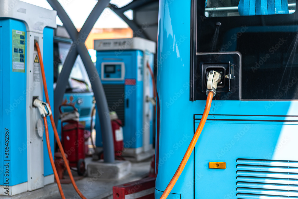 Wall mural bus charging in station