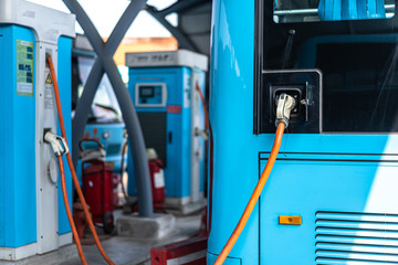 Naklejka premium bus charging in station