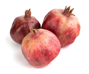 Ripe pomegranate fruit isolated on white background cutout