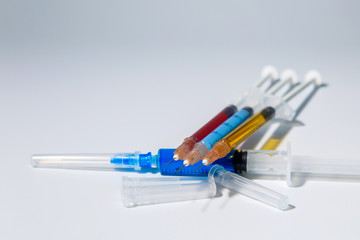 The concept of medical injections for cosmetology and new invented drugs. Set of medical syringes...