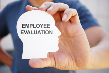 Business photo shows printed text employee evaluation