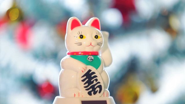 The maneki-neko, Beckoning cat - Japanese Lucky Charm