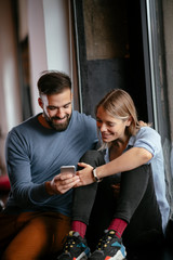 Young happy couple. Boyfriend and girlfriend having fun.