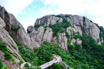 Fototapeta na wymiar People visit Huangshan (Yellow Mountain) at Anhui province China in a Sunny Day. Huangshan is a UNESCO World Heritage Site and one of China's major tourist destinations.