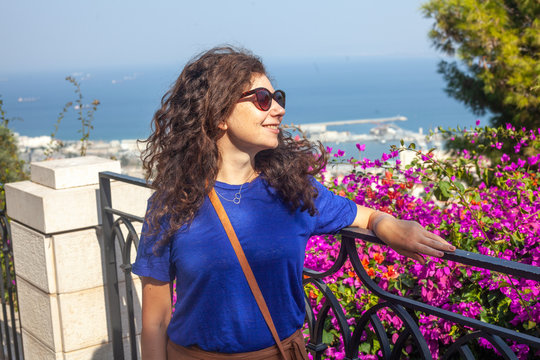 Marta posing at the top of a hanged garden in Haifa