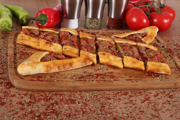 a  Photo of Turkish food  pide pizza lahmacun Meat and tomatoes for Hotel & Restaurant Orders and Menu and Internet and TV