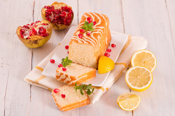 Lemon sponge cake with pomegranate.