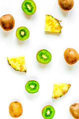 exotic fruit design with kiwi on white background top view pattern