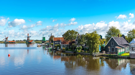 Fototapeta na wymiar Windmills in the village of Volendam in the Netherlands.