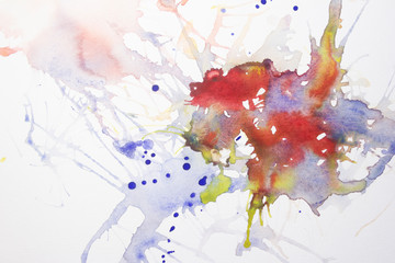 Abstract watercolor stains and stains of blue, red and yellow. Template for design. White background.
