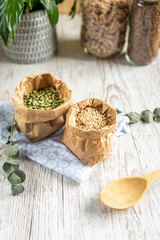 zero waste cooking: buy by weight, with wooden spoon, vertical