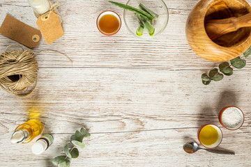 make your own natural beauty products, flat-lay with space on the center