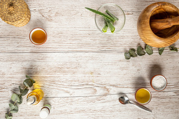 ingredients for natural beauty products, flat-lay with space on the center