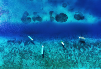 Boats from air. Aerial view on the sea. Summer seascape with clear water in the sunny day. Travel - image