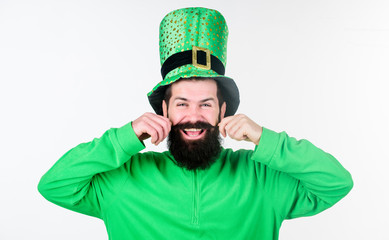 Global celebration of irish culture. Man bearded hipster wear green clothing and hat patricks day....