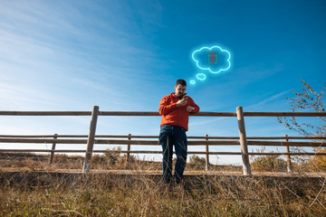 man with mobile phone with gift box symbol