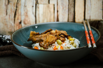 Asian style caramel pork with rice and vegetable