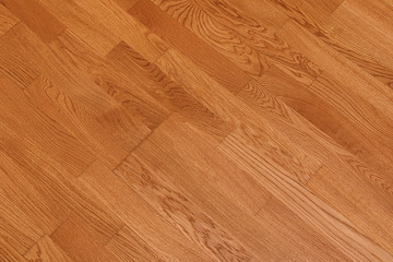 Brown laminate floor texture background. natural wooden polished surface parquet