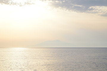 Seascape - view of Samothraki island Greece on sunset - from ferry to Gokceada island, Canakkale, Turkey