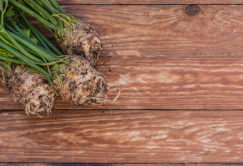 Food from nature. Fresh  vegetables from the garden..Fresh delicious celery on an wooden Table.