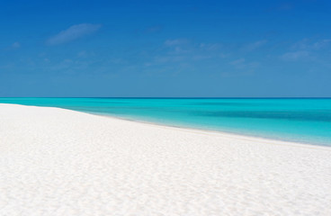 Fantastic white sand beach with clear blue water. Summer outdoor nature holiday serenity. Beautiful clean and clear sandy beach with ocean background summer concept. Kuramathi island, Maldives.