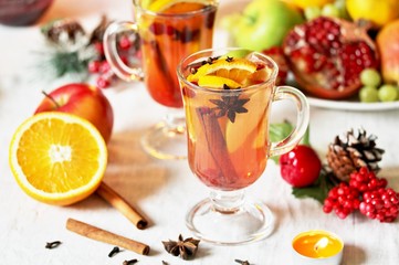 hot winter drink Cranberry Apple Cider Punch. Garnish with apples, oranges, and cranberries. hot...
