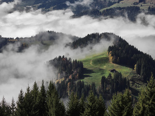 Views of the cloudy valley from the Col des Mosses in the Bernese Alps of Switzerland