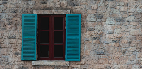 Fototapeta na wymiar Open window on the brick wall background with copy space.