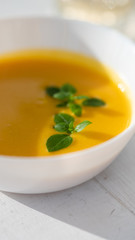 pumpkin soup with herbs. vegan food. 