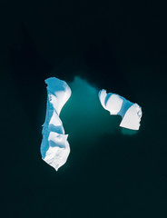 An Iceberg Of Colossal Size In The Form Of A Castle seen from above aerial. Floats In The Cold...
