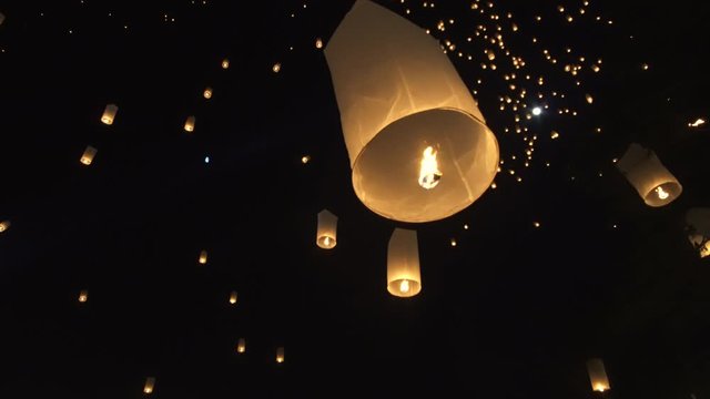 Hand releasing lanterns in festival Chiang Mai Thailand