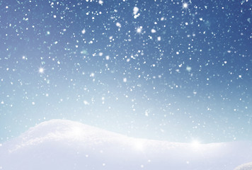 Winter  background with snow and blurred bokeh.Merry Christmas and happy New Year greeting card with copy-space.