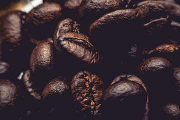 The raw coffee beans are preparing to grind into delicious coffee.This image is soft focus.
