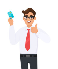 Young businessman showing credit, debit, ATM card and making thumb up gesture sign. Person holding digital payment card. Male character design illustration. Modern lifestyle, concept in cartoon style.