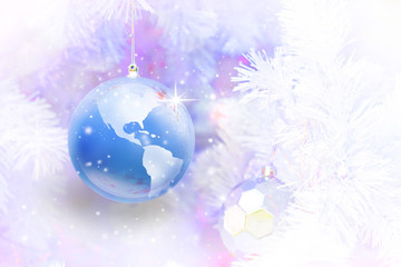 Blue Earth ornament on white christmas tree with blurred background, Gift earth a great christmas concept