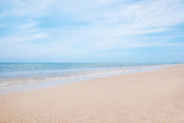 Fototapeta na wymiar Beautiful view of sandy beach and sea on sunny day
