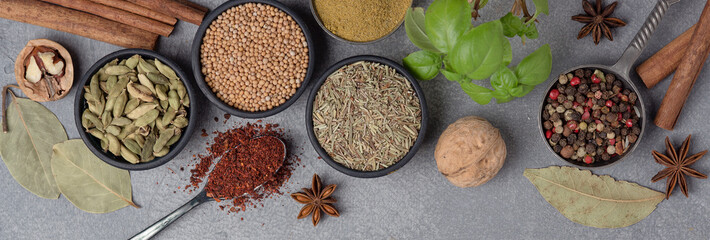 Wooden table of colorful spices. Top view