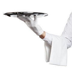 Waiter hand in glove with towel holding big silver tray, isolated on white background