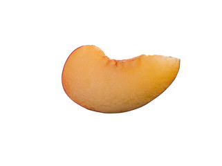 Slice of smooth-skinned, purple plum fruit without kernel isolated on white background with copy space for text or images. Side view. Close-up shot.