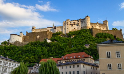 Fototapeta na wymiar Famous Hohensalzburg Fortress on a hill in Salzburg, Austria