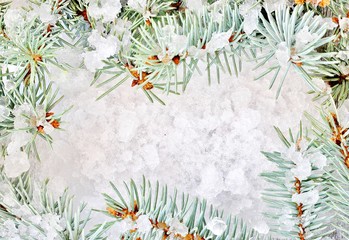 New Year and Christmas background with blue spruce, ice crystals and snow flakes. place for text. copy space. top view