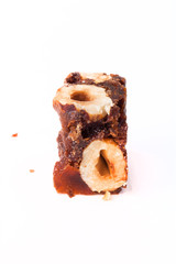 Candy with nuts on light background