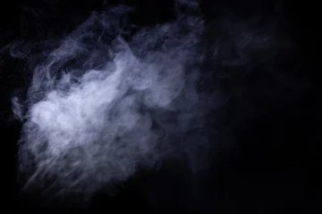 Poster Jet of smoke on black background. Selective focus © strannik_fox